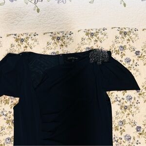 Elegant Black Dress with Embellished Shoulder